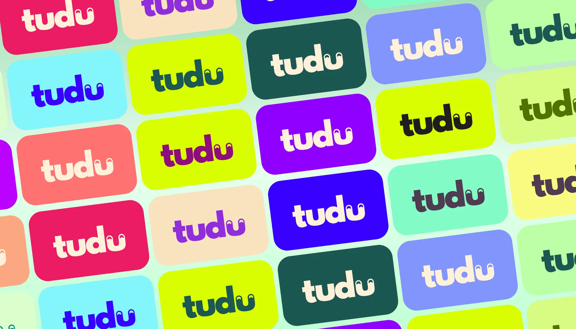 The Tudu wordmark repeated across tiles in the full brand colour palette